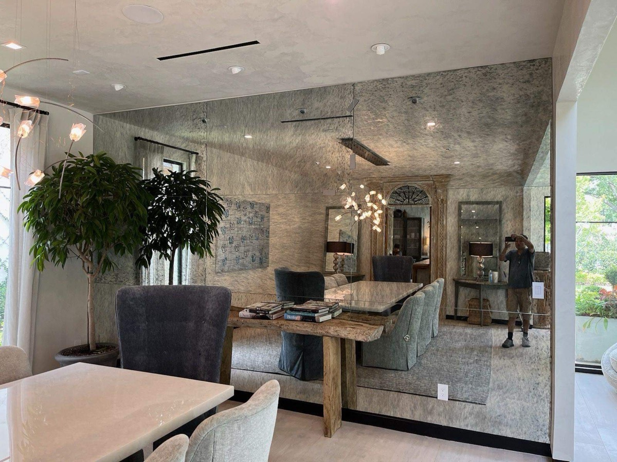 Antiqued mirror wall — wide angle showing full installation