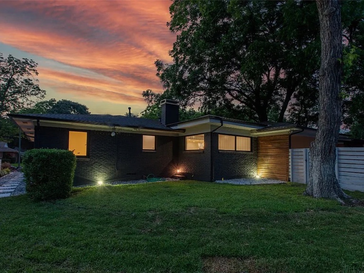 Residential window installation — side exterior at sunset