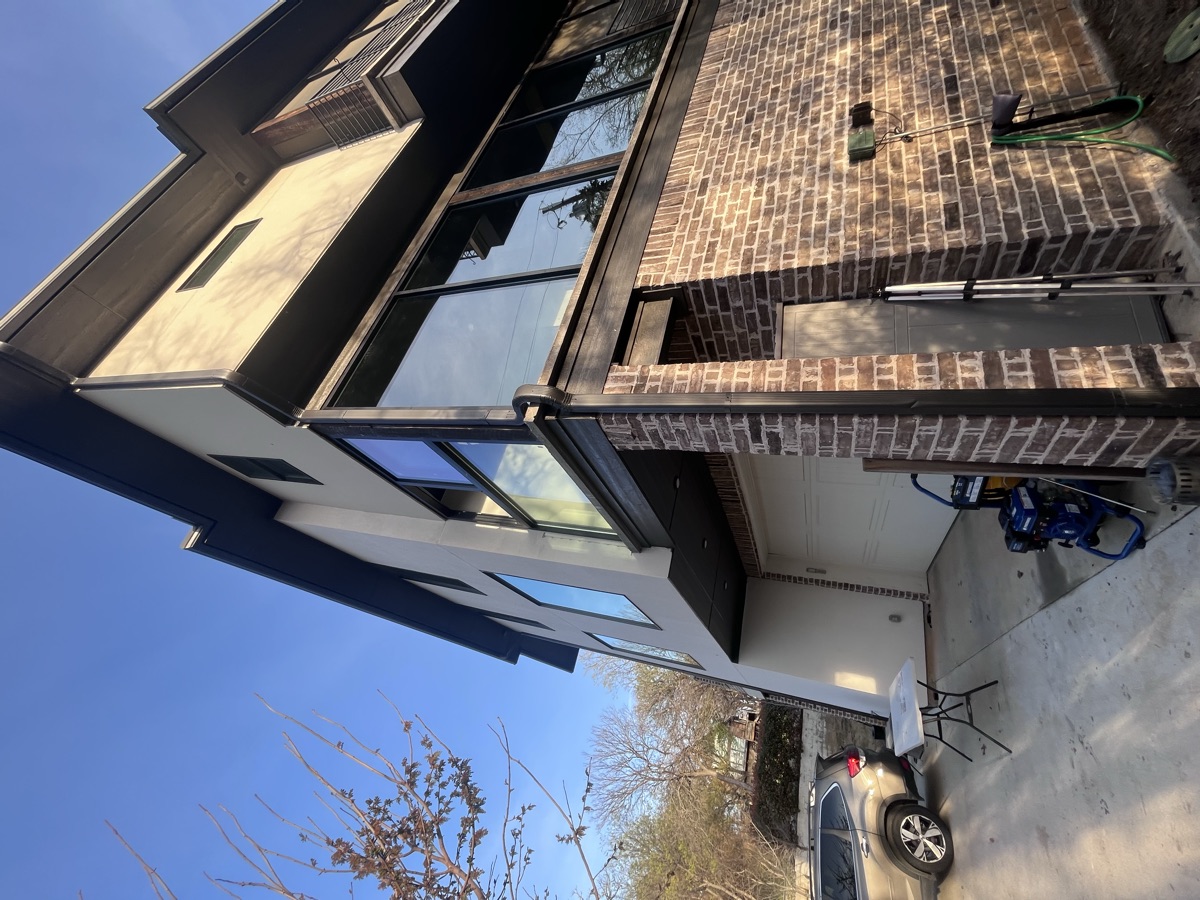 Modern home exterior — multi-story window package